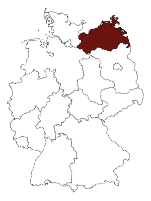 Eine Karte von Deutschland ist an der Stelle Mecklemburg- Vorpommerns rot markiert